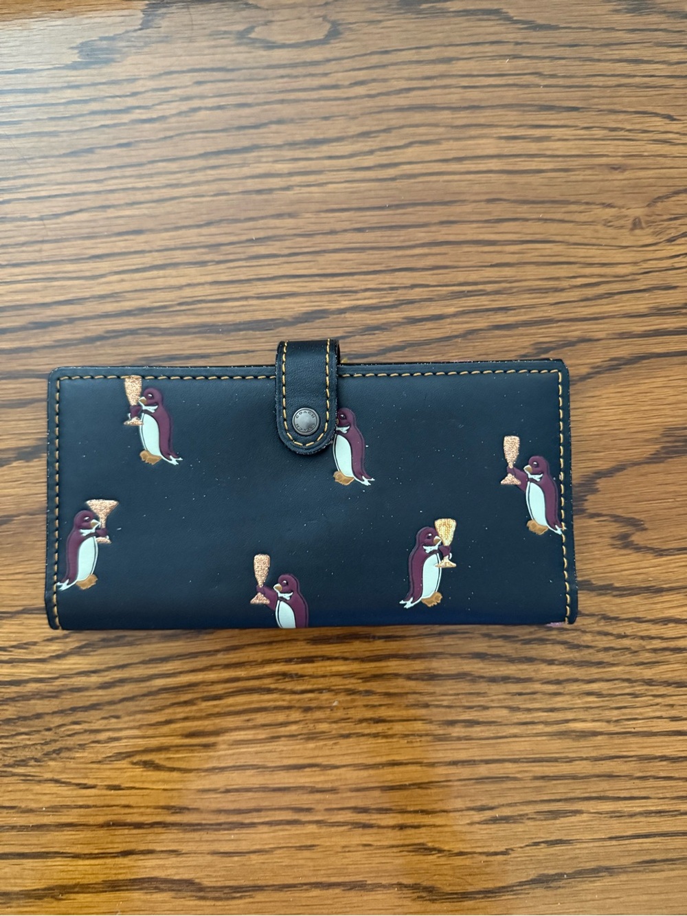 Coach Black Wallet with Burgundy Penguin & Gold Print